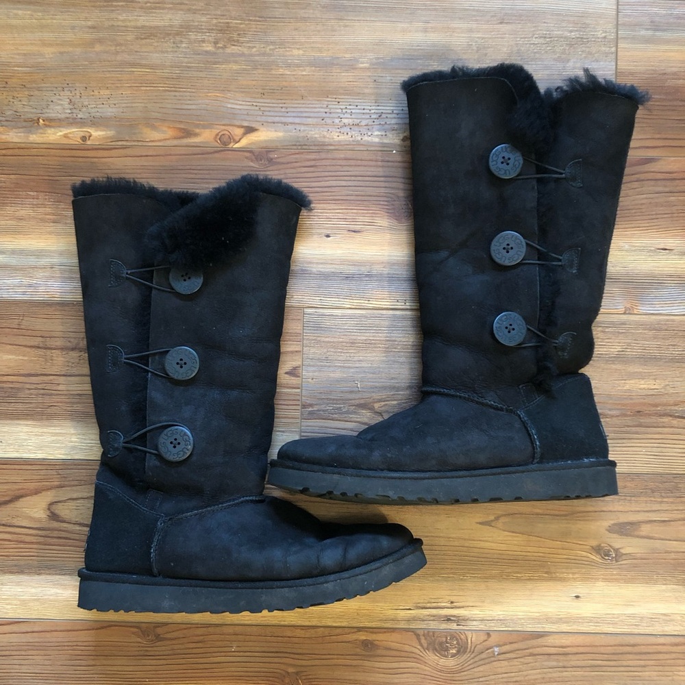 Black mid-calf lined boots
